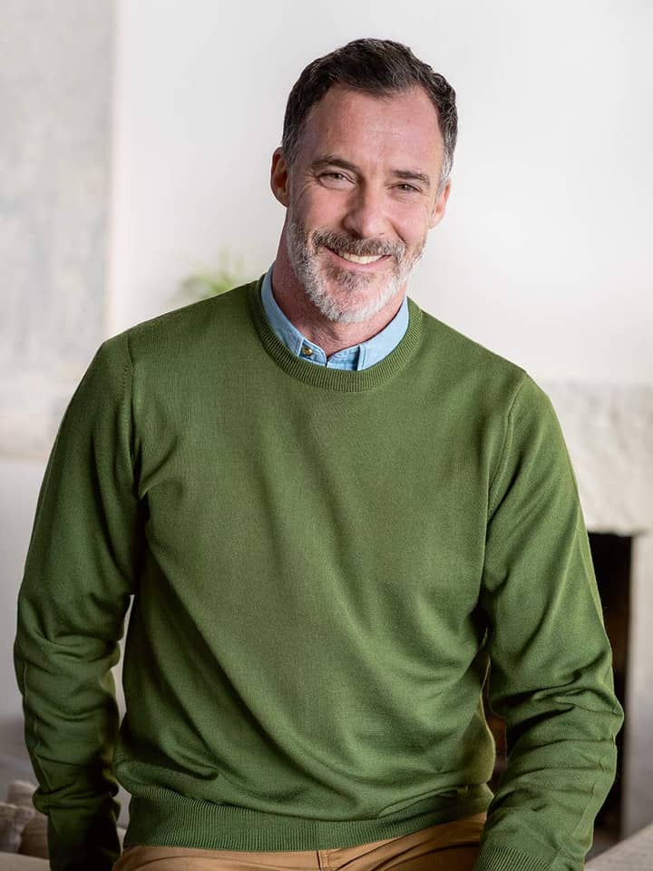 Men's Leaf Green Merino Wool Crew Neck Jumper On Model